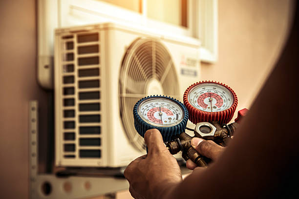 Professional Heat Pump Repair technician working in Midland, TX